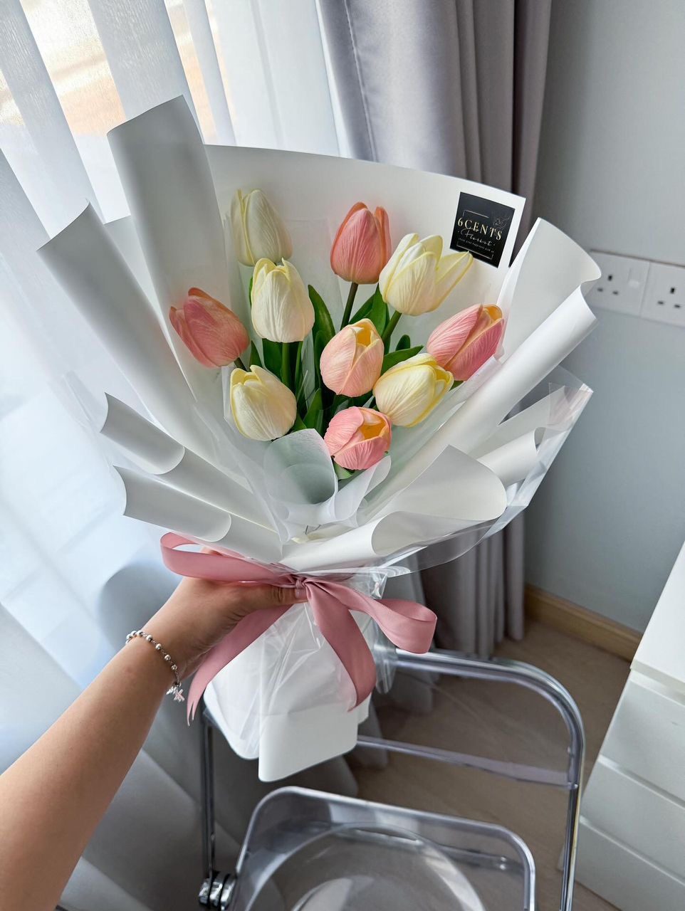 Tulip bouquet with pink ribbon